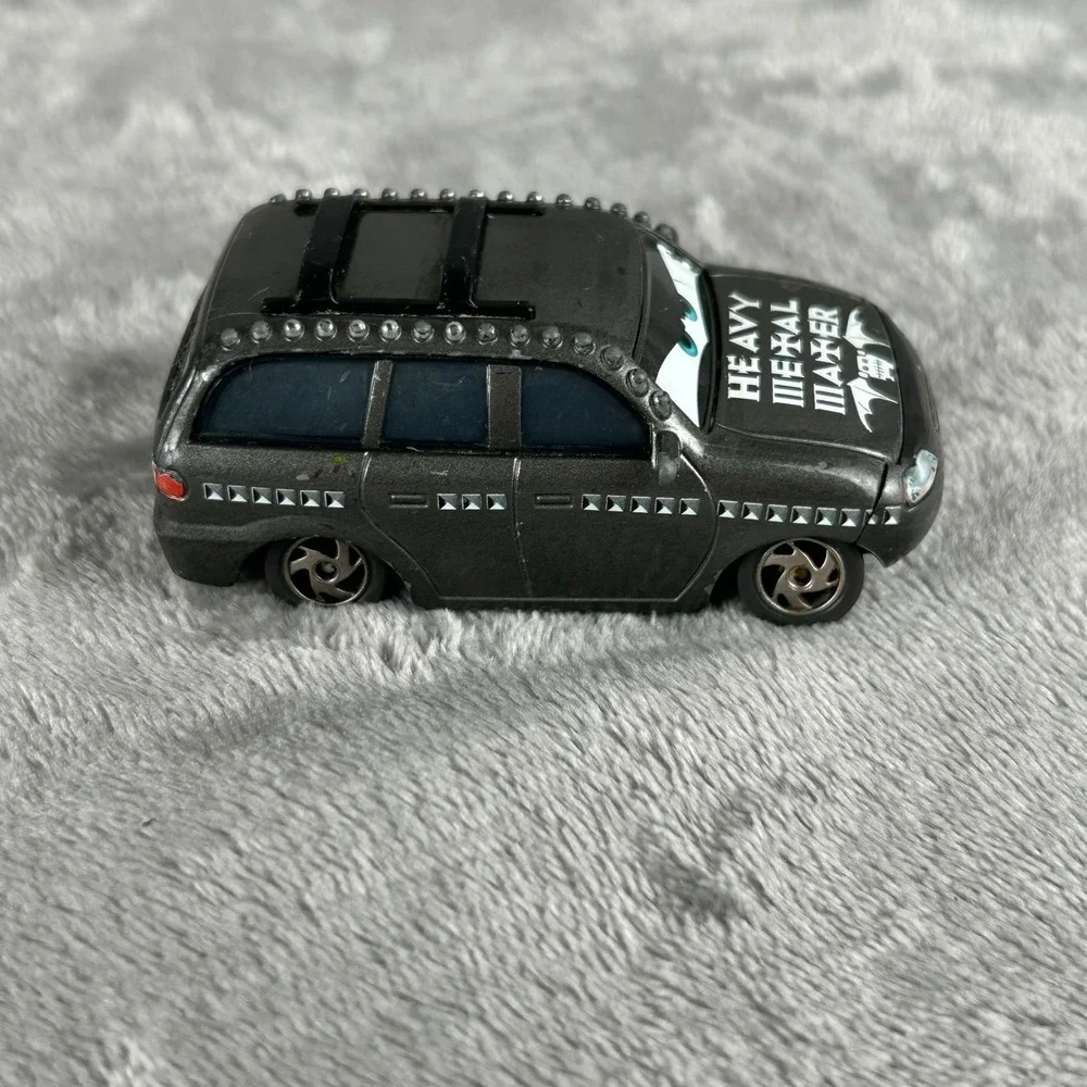 Disney Pixar Cars Heavy Metal Mater Diecast Rocking Rodney Minivan Black Studded